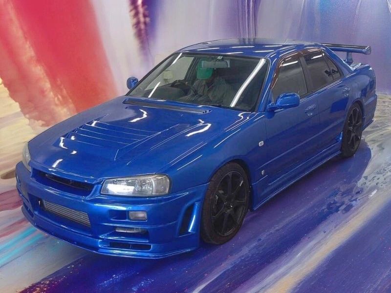 Blue widebody R34 Nissan Skyline GTX-T
